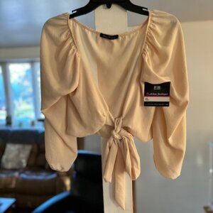 glow passion cream colored tie front top size m nwt